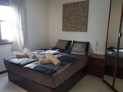 Double bedroom at Casa Sol y Playa with built-in wardrobe and natural light